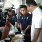 Aiptu NSW saat dihadirkan dalam pemusnahan barang bukti. (foto: Liputan6.com/felek wahyu)