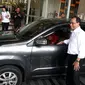 Menhub Budi Karya Sumadi naik taksi online (Foto: Ilyas Liputan6.com)