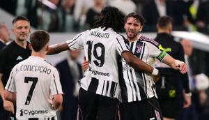 Juventus' French midfielder #19 Khephren Thuram-Ulien celebrates scoring his team's second goal with Juventus' Italian midfielder #05 Manuel Locatelli during the Italian Serie A football match between Juventus and Bologna at the Allianz stadium in Turin, on April 19, 2026.
Marco BERTORELLO / AFP