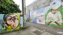 Pemandangan mural bertema Islami di Gang Abdul Jabar, Jagakarsa, Jakarta, Senin (28/5). Sejumlah mural bertema Islami  menghiasai Gang Abdul Jabar dalam menyambut Ramadan. (Liputan6.com/Herman Zakharia)