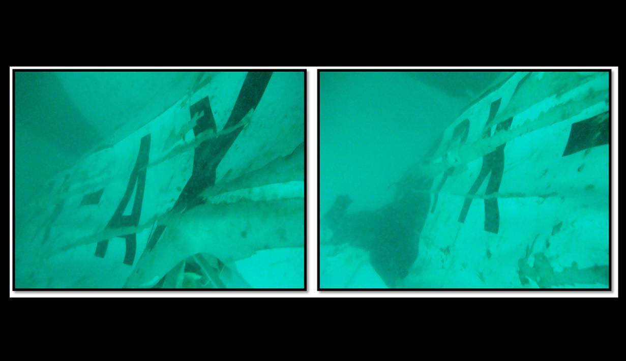 Penampakan sejumlah huruf yang melekat pada ekor pesawat AirAsia QZ8501 yang ditemukan Tim SAR di Perairan Selat Karimata, Rabu (7/1/2015).(Dokumentasi TNI)