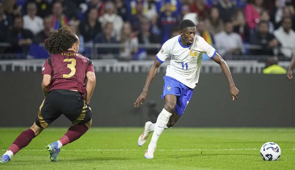 Prancis sukses membungkam Belgia dengan dua gol tanpa balas dalam laga matchday 2 UEFA Nations League 2024/2025 yang digelar di Parc Olympique Lyonnais, Selasa (10/9/2024) dini hari WIB. (AP Photo/Laurent Cipriani)