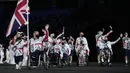 Atlet dari Inggris memasuki stadion saat upacara pembukaan Paralimpiade 2020 Paralimpiade Tokyo 2020 di Olympic Stadium, Tokyo, Selasa (24/8/2021) malam WIB. Setelah ditunda selama setahun akibat pandemi Covid-19, Paralimpiade Tokyo 2020 akhirnya resmi dibuka. (AP Photo/Shuji Kajiyama)