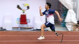 Atlet lari Asian Para Games 2018 dari negara Jepang saat latihan di Stadion Madya, Kompleks GBK, Jakarta, Kamis (4/10). Asian Para Games 2018 berlangsung di Jakarta, 6-13 Oktober dan diikuti 41 negara. (Liputan6.com/Helmi Fithriansyah)