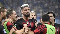 Olivier Giroud (tengah)&nbsp;berselebrasi dengan rekan setimnya setelah mencetak gol ke gawang Sampdoria dalam pertandingan Liga Italia di&nbsp;Stadion Comunale Luigi Ferraris, Genova, Minggu (11/9/2022) dini hari WIB. AC Milan menang 2-1.&nbsp;(Tano Pecoraro / LaPresse via AP)