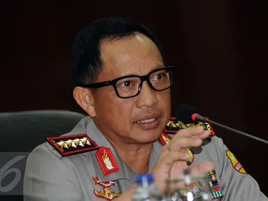 Kapolri Jenderal Tito Karnavian memberi keterangan saat rilis kasus Ahok di Gedung Rupatama, Mabes Polri, Jakarta, Selasa (16/11). Ahok ditetapkan menjadi tersangka terkait kasus dugaan penistaan agama. (Liputan6.com/Helmi Fitriansyah)