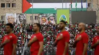 Ilustrasi Timnas Palestina jelang melakoni sebuah pertandingan. (Ahmad GHARABLI / AFP)