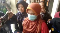 AM, ibu tiri IMK, telah ditetapkan sebagai tersangka penganiyaan anak tirinya. (Foto: Liputan6.com/Muhamad Ridlo).