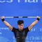 Lifter putra Indonesia, Rahmat Erwin Abdullah, saat beraksi di final 73 kilogram cabang angkat besi  Asian Games 2022 di Xiaoshan Sports Centre Gymnasium, Hangzhou, China, Selasa (3/10/2023). Total Rahmat Erwin mengumpulkan total angkatan 359kg. Torehan itu jadi rekor baru di Asian Games. (AP Photo/Louise Delmotte)