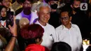 Ganjar Pranowo dan Mahfud MD tampil dengan busana serba putih ketika datang ke Gedung Arsip Nasional sebagai tempat deklarasi. (Liputan6.com/Herman Zakharia)