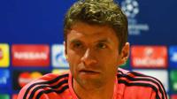 TERTEKAN - Thomas Muller menyebut Arsenal berada dalam tekanan besar jelang partai melawan Bayern Munchen. (Standard)
