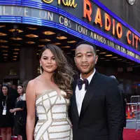 Selain itu, ada juga sumber yang mengatakan bahwa keduanya sering bertengkar selama ini. Dan ini menyebabkan Teigen depresi hingga mengkonsumsi minuman beralkohol sebagai pelariannya. (AFP/Jenny Anderson)