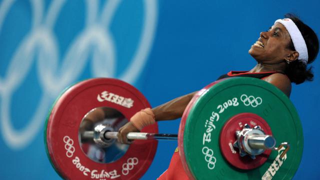 Potret Perjuangan Lisa Rumbewas Meraih Tiga Medali Olimpiade Cabor Angkat Besi