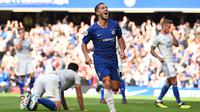 Bintang Chelsea Eden Hazard merayakan gol ke gawang Cardiff City pada laga Liga Inggris di Stamford Bridge, Sabtu (15/9/2018). (AFP/Glyn Kirk)
