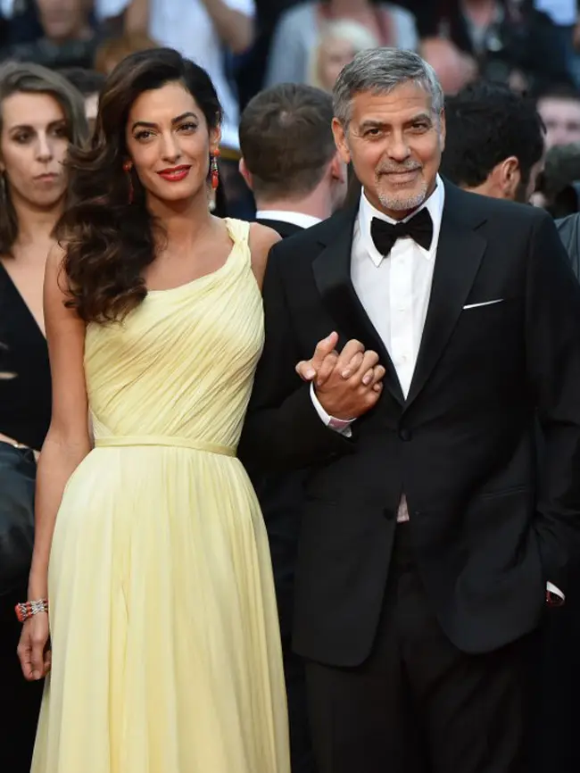 George Clooney dan Amal Alamuddin. (AFP/ALBERTO PIZZOLI)