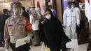 Etty binti Toyib saat tiba di bandara Soekarno Hatta, Tangerang, Senin (6/7/2020). Sebelumnya Etty didakwa menjadi penyebab meninggalnya sang majikan, Faisal al-Ghamdi dengan tuduhan meracuni sang majikan. (Liputan6.com/Angga Yuniar)