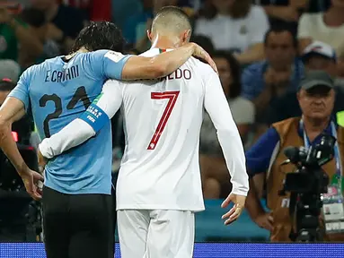 Kembalinya Cristiano Ronaldo yang sudah identik dengan sebutan CR7 ke Manchester United menimbulkan polemik soal nomor punggung yang akan digunakan. Di luar dugaan, Edinson Cavani dengan legowo mau memberikan nomor tersebut kepada CR7. Berikut kronologinya. (Foto: AFP/Odd Andersen)