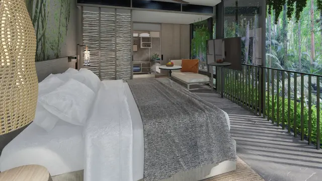 Nikmati keindahan alam di One-Bedroom Suite Mandai Rainforest Resort, dengan tempat tidur king-size mewah dan ruang tamu terpisah yang menawarkan pemandangan taman dan waduk. Suasana tenang ini sempurna untuk relaksasi. (Foto/Sumber: Mandai Wildlife Group)