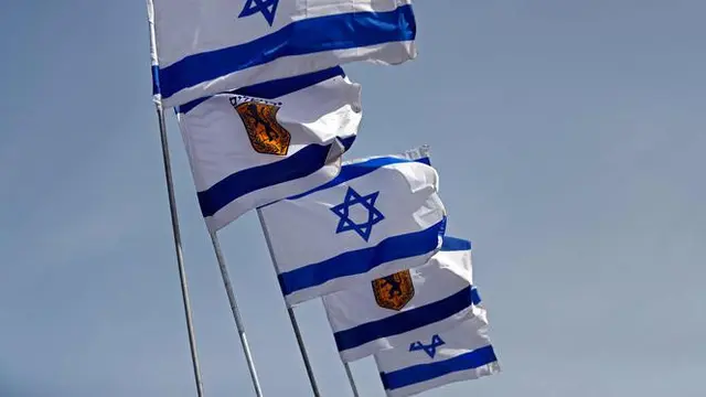 Bendera Israel. (AFP Photo/Thomas Coex)