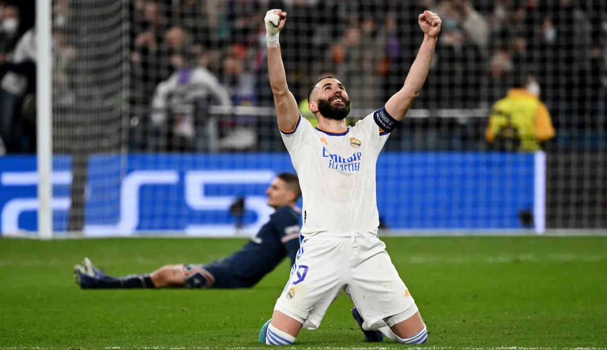 Hattrick yang dicetak Karim Benzema ke gawang PSG pada leg kedua 16 besar Liga Champions membuat striker asal Prancis itu melesat ke posisi ketiga dalam daftar top scorer Liga Champions. Sejauh ini ia telah mengemas delapan gol. (AFP/Gabriel Bouys)
