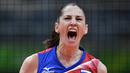 Tatyana Kosheleva melakukan selebrasi saat meraih point dalam bertanding melawan tim dari Korea Selatan di ajang Olimpiade 2016 di Maracanazinho, Rio de Janeiro, Brasil, (8/8). (AFP PHOTO/Johannes EISELE)