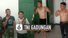 Video TNI gadungan terciduk dan diberikan hukuman unik viral di media sosial.