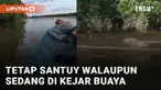 Aksi pria tertidur di perahu dan tidak sengaja bertemu buaya saat di sungai mengundang perhatian