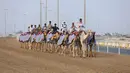 Kegiatan tersebut berlangsung di arena balap super luas bernama Al-Shahaniya Camel Racetrack atau dekat dengan lokasi latihan Timnas Portugal selama Piala Dunia 2022. (Bola.com/Ade Yusuf Satria)