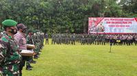 Apel pasukan TNI Polri yang akan bertugas melakukan pengamanan TPS di Balai Kota Depok, Senin (7/12/2020). (Foto: Liputan6/Dicky Agung Prihanto)
