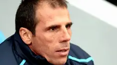 West Ham Manager Gianfranco Zola watches players warm up ahead of a Premiership match against Portsmouth at Boleyn Ground, London, on November 15, 2008. AFP PHOTO/Leon Neal