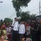 Capres Jokowi dan Cawapres Ma'ruf Amin di Kampung Deret, Johar Baru, Jakarta Pusat, Selasa (21/5/2019). (Lizsa Egeham)