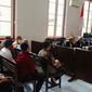 Melati Bunga Sombe, terdakwa kasus dugaan pemalsuan bilyet, giro dan deposito pada salah satu bank plat merah di Makassar (Liputan6.com/Eka Hakim)