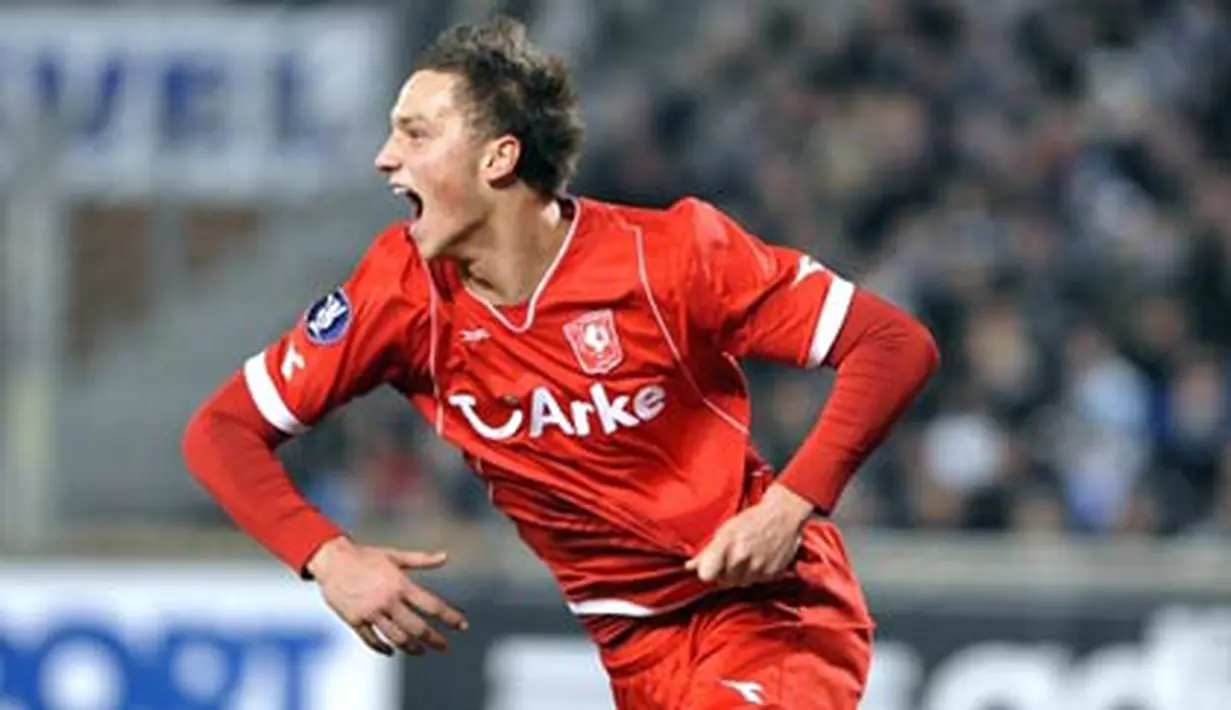 Reaksi striker FC Twente, Marko Arnautovic seusai melesakkan gol dalam partai Piala UEFA antara Marseille vs Twente, 19 Februari 2009 di Stade Velodrome, Marseille. AFP PHOTO/GERARD JULIEN