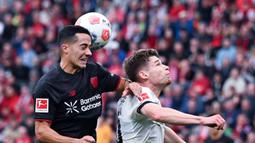 Bayer Leverkusen mampu membuka keunggulan terlebih dulu pada pertandingan itu. Pemain asal Amerika Serikat, Malik Tillman, mencetak gol untuk tuan rumah pada menit ke-70. (Federico Gambarini/dpa via AP)