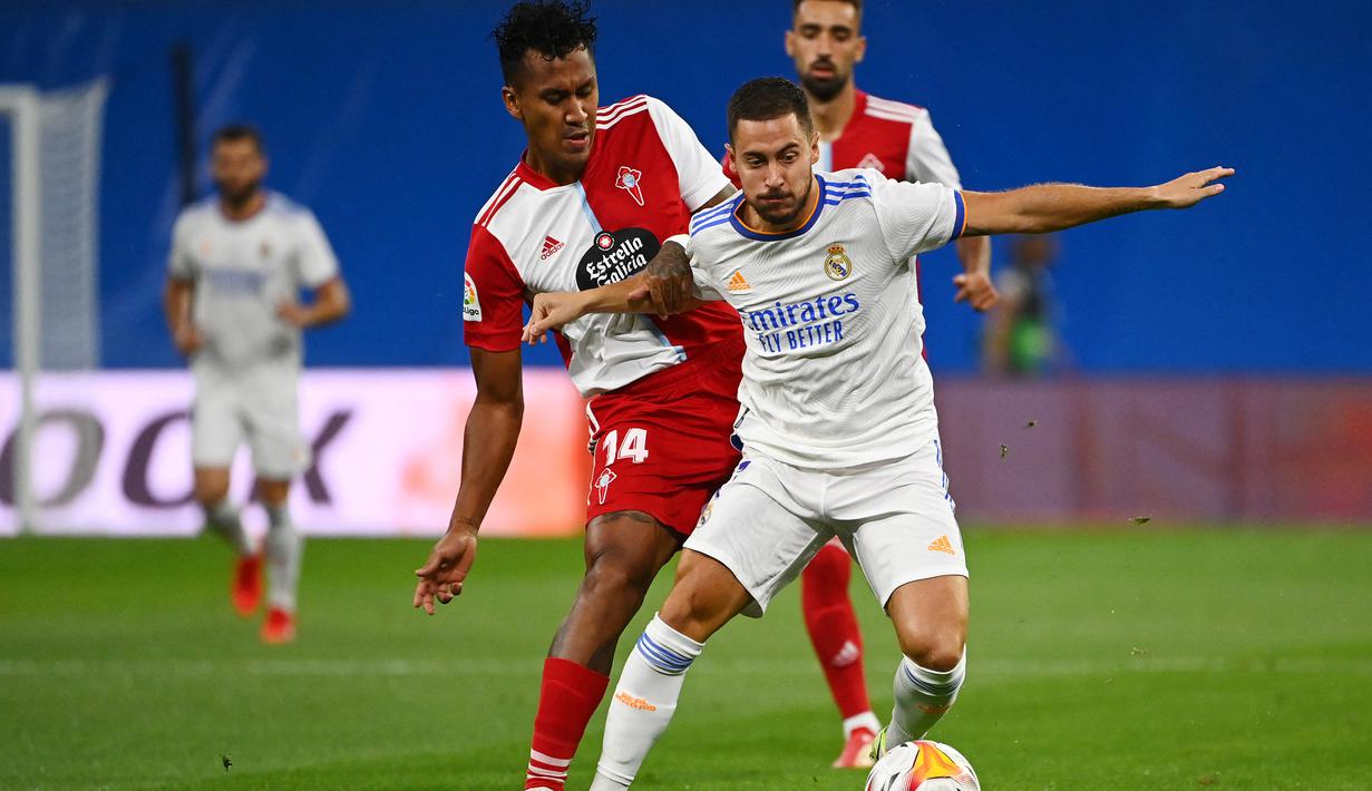 Eden Hazard. Perubahan posisi yang dilakukan Carlo Ancelotti membuat penampilannya makin berkembang. Saat posisi sejatinya di sayap kiri dipercayakan kepada Vinicius Junior, Don Carlo dengan cerdik memberinya tempat di belakang striker yang dapat dioptimalkannya dengan baik. (AP/Gabriel Bouys)