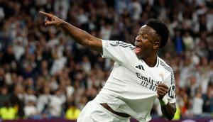 Dua menit berselang, Vinicius Junior berhasil mencetak penyeimbang. (Pierre-Philippe MARCOU/AFP)