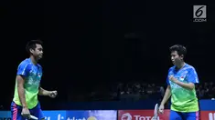 Ganda campuran Indonesia, Tontowi Ahmad/Liliyana Natsir saat melawan Hafiz Faizal/Gloria Emanulle Widjaja pada semifinal Indonesia Open 2018 di Istora GBK, Jakarta, Sabtu (7/7). Tontowi/Liliyana unggul 21-18, 21-8. (Liputan6.com/Helmi Fithriansyah)