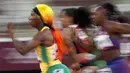 Shelly-Ann Fraser-Pryce dari Jamaika berlari dalam semifinal lari 100 meter putri Olimpiade Tokyo 2020 di Tokyo, Jepang, 31 Juli 2021. (AP Photo/David J. Phillip)