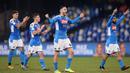 Pemain Napoli Konstantinos Manolas (tengah) dan rekan-rekan setimnya merayakan kemenangan atas Lazio pada perempat final Coppa Italia di Stadion San Paolo, Napoli, Italia, Selasa (21/1/2020). Napoli sukses melaju ke semifinaL Coppa Italia setelah mengalahkan Lazio 1-0. (LaPresse via AP)