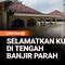Hujan deras yang masih turun hingga Jumat malam menyebabkan ketinggian air di Desa Kalangligar, Kecamatan Telukjambe Barat, Karawang, Jawa Barat, terus mengalami kenaikan pada Sabtu. Ketinggian air dilaporkan mencapai titik tertinggi hingga tiga mete...