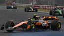 Pembalap McLaren, Lando Norris memacu mobilnya dalam ajang balap Formula 1 GP Hungaria 2025 di sirkuit Hongaroring, Minggu (03/08/2025) waktu setempat. (AP Photo/Denes Erdos)