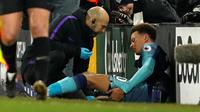 Dele Alli dipastikan absen membela Tottenham Hotspur hingga awal Maret 2019, karena dibekap cedera hamstring. (AFP/Adrian Dennis)