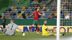 Pemain Portugal Diogo Jota melakukan selebrasi usai mencetak gol ke gawang Swedia pada pertandingan UEFA Nations League di Stadion Jose Alvalade, Lisbon, Portugal, Rabu (14/10/2020). Portugal menang 3-0. (AP Photo/Armando Franca)