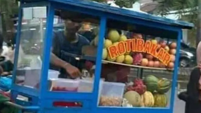6 Cara Promosi Penjual Roti Bakar Ini Nyeleneh