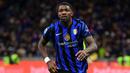 Di sisa waktu pertandingan, pada menit ke-90+2, gol Marcus Thuram menggandakan sekaligus mengunci kemenangan Inter Milan atas Como. (Piero CRUCIATTI/AFP)