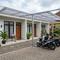 Kamar Kos di Halaman Rumah untuk Usaha Pensiunan (Foto: Gemini AI)