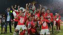 Bali United pun sukses mempertahankan gelar juara di Liga 1 setelah menjadi juara pada edisi terakhir 2019. Tahun 2020 Liga 1 dihentikan akibat merebaknya wabah COVID-19. (Bola.com/M Iqbal Ichsan)