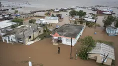 Rumah-rumah terendam banjir di Pantai Salinas setelah lewatnya Badai Fiona di Salinas, Puerto Rico, Senin, 19 September 2022. Badai Fiona yang menerjang Puerto Rico menyebabkan banjir dan tanah longsor. (AP Photo/Alejandro Granadillo)