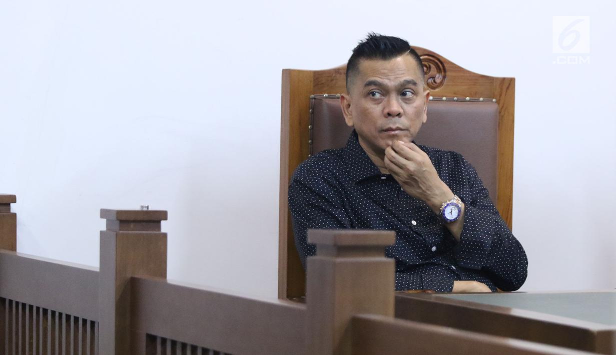Mantan anggota DPRD DKI Jakarta, Mohamad Sanusi saat menjalani sidang lanjutan Peninjauan Kembali (PK) di PN Jakarta Pusat, Rabu (25/7/2018). M Sanusi merupakan terpidana suap pembahasan Raperda tentang Reklamasi. (Liputan6.com/Helmi Fithriansyah)