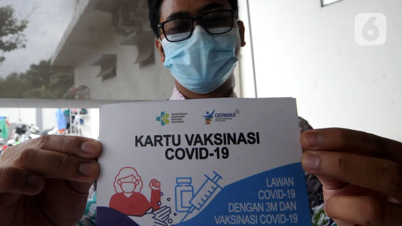 FOTO: Puskesmas di Jakarta Mulai Lakukan Vaksinasi Virus Corona COVID-19